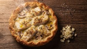 Tarte au poisson et champignons : recette facile et savoureuse