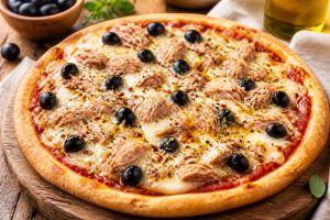 Tarte au thon et olives noires façon pizza : recette savoureuse