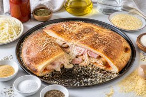Recette pizza calzone jambon champignons : délicieux et facile