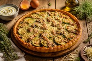 Tarte courgette champignon thon à la tomate : recette savoureuse