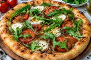 Pizza tomate chèvre oignon : recette savoureuse et facile